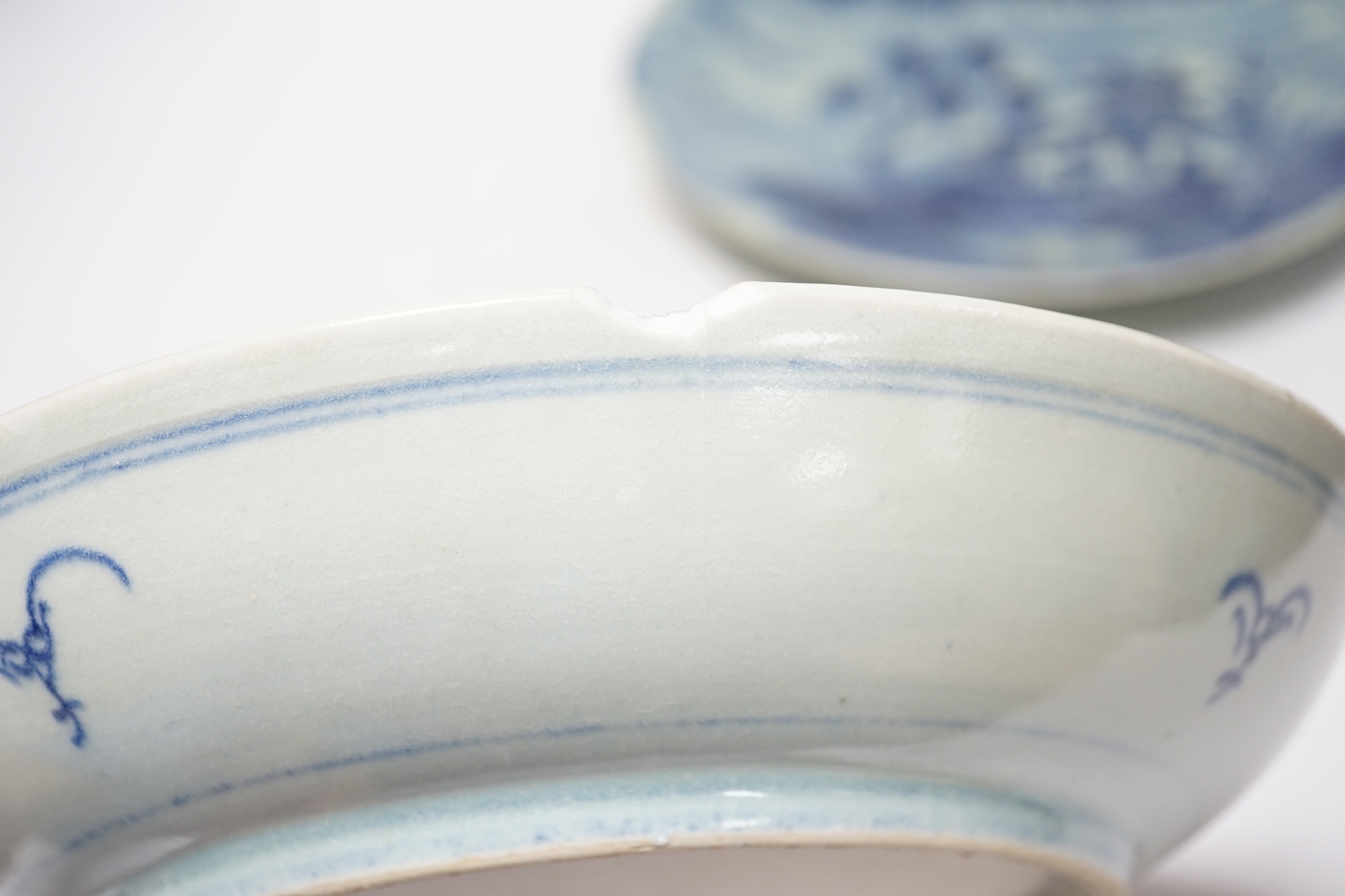 A 19th century Chinese celadon glazed blue and white landscape dish and a Diana Cargo dish, landscape dish 29.5cm diameter